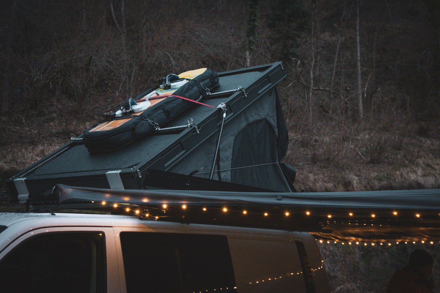 Mercedes Vito with roof tent set up and outdoor equipment
