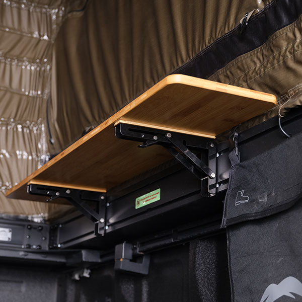 Folding table. Mounted on the side inside, folds away, the perfect storage surface.